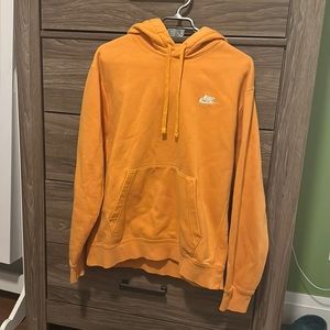 Orange Nike hoodie size M